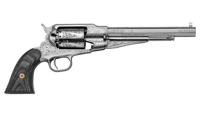 Réplique Pietta du revolver Remington 1858 calibre .44 avec finition nickelée et gravures décoratives, présentée sur fond blanc.